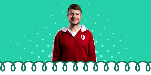 A smiling student and a tight coil banner at the bottom